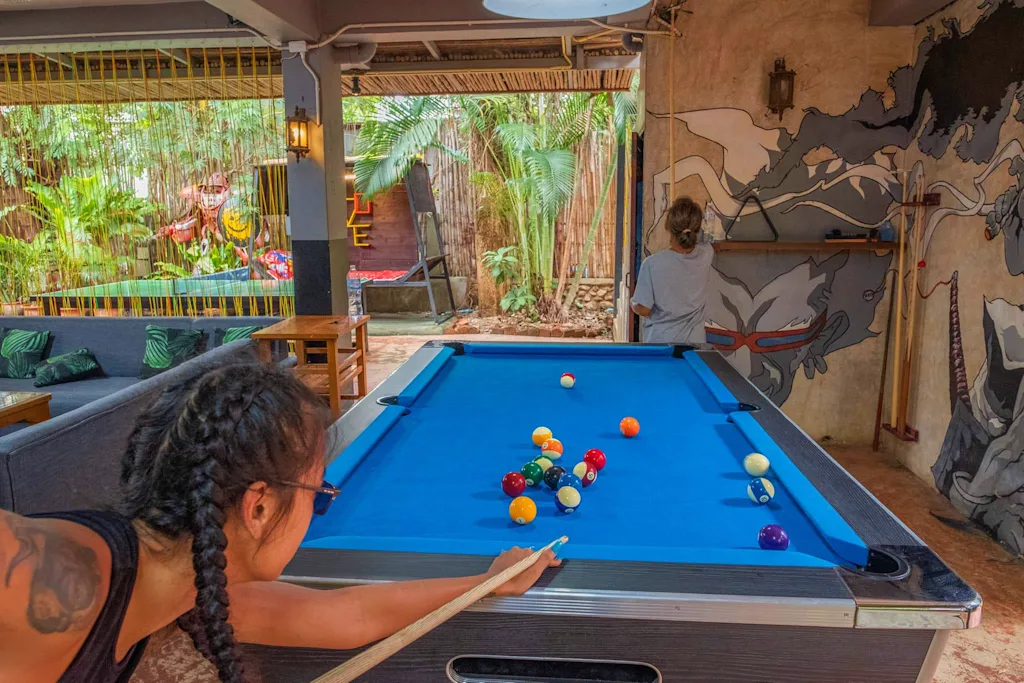 Pool table at Happy House backpackers hostel in Pai